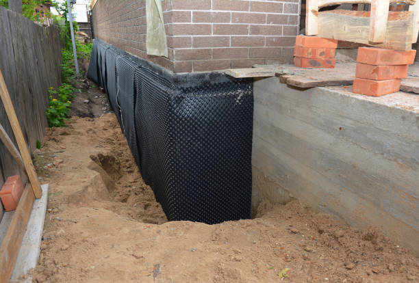 Happy homeowners after waterproofing job in Woodbridge